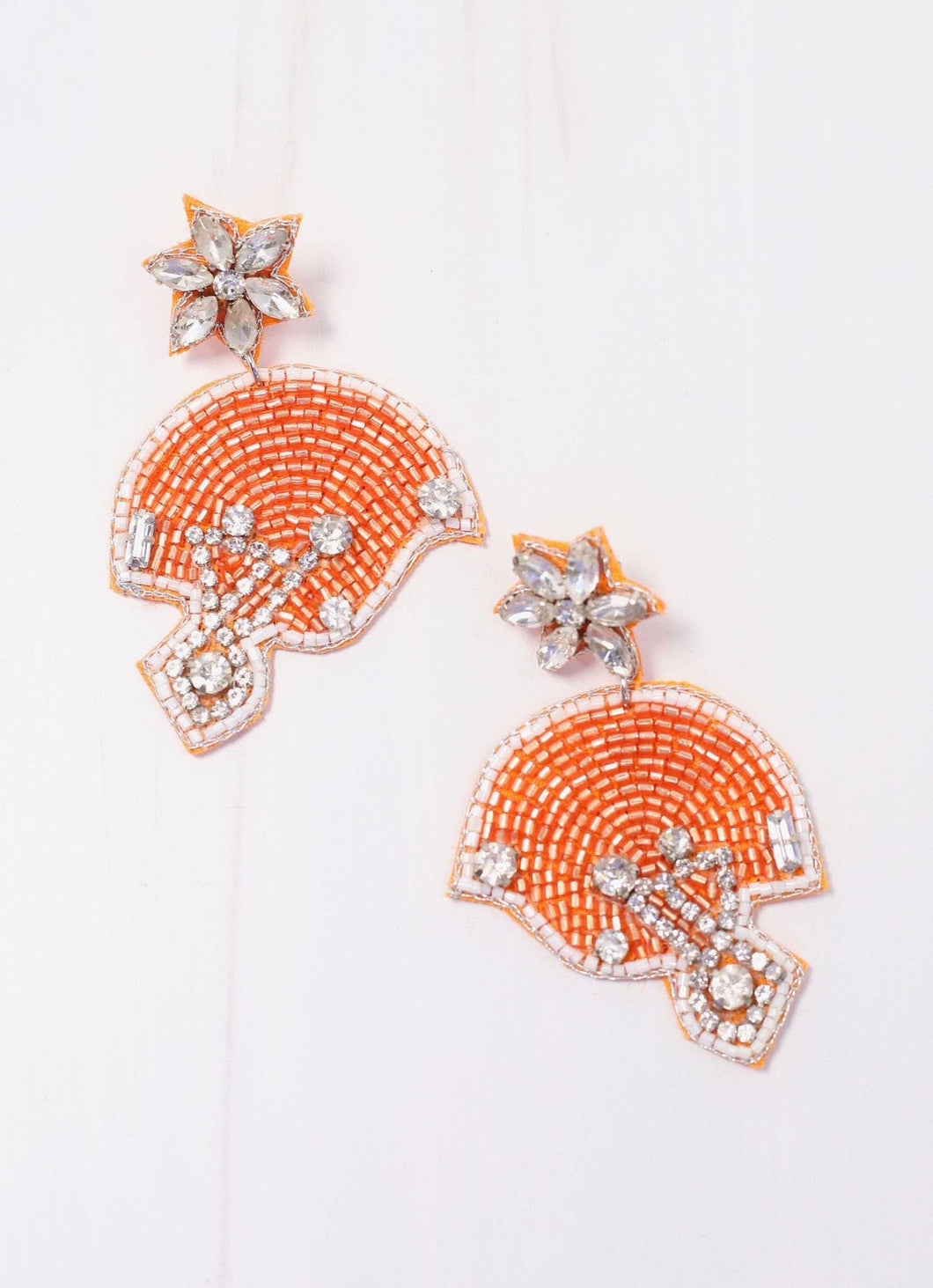Beaded and embellished orange and white football helmet earrings perfect for gamedays and tailgates